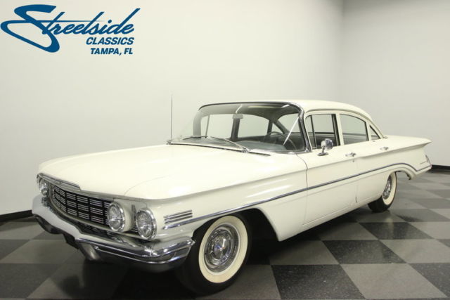 1960 White Oldsmobile 88 Sedan