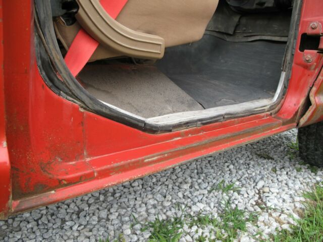 1967 red Ford F-250 Crew Cab Pickup