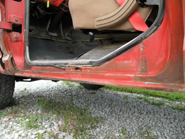 1967 red Ford F-250 Crew Cab Pickup