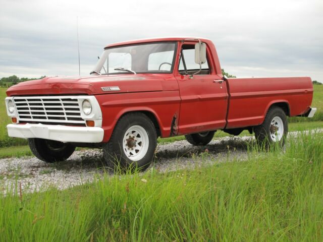 1967 red Ford F-250 Crew Cab Pickup