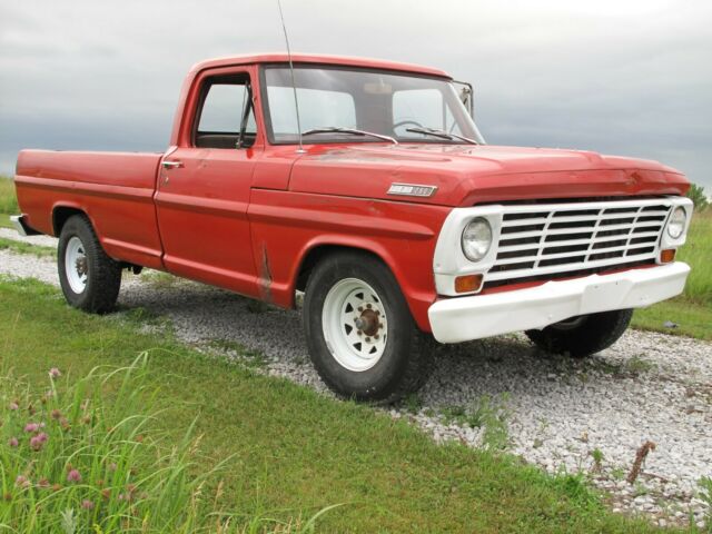 1967 red Ford F-250 Crew Cab Pickup