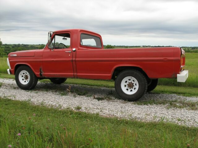 1967 red Ford F-250 Crew Cab Pickup