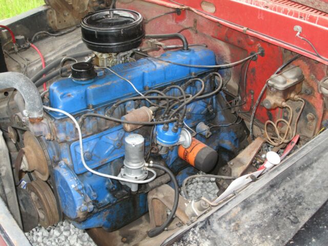 1967 red Ford F-250 Crew Cab Pickup