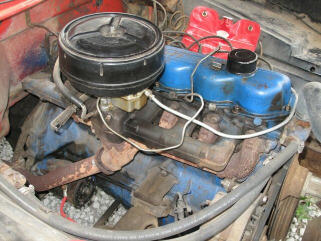 1967 red Ford F-250 Crew Cab Pickup