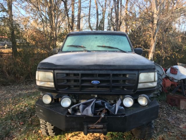 1994 Black Ford Bronco pu/suv
