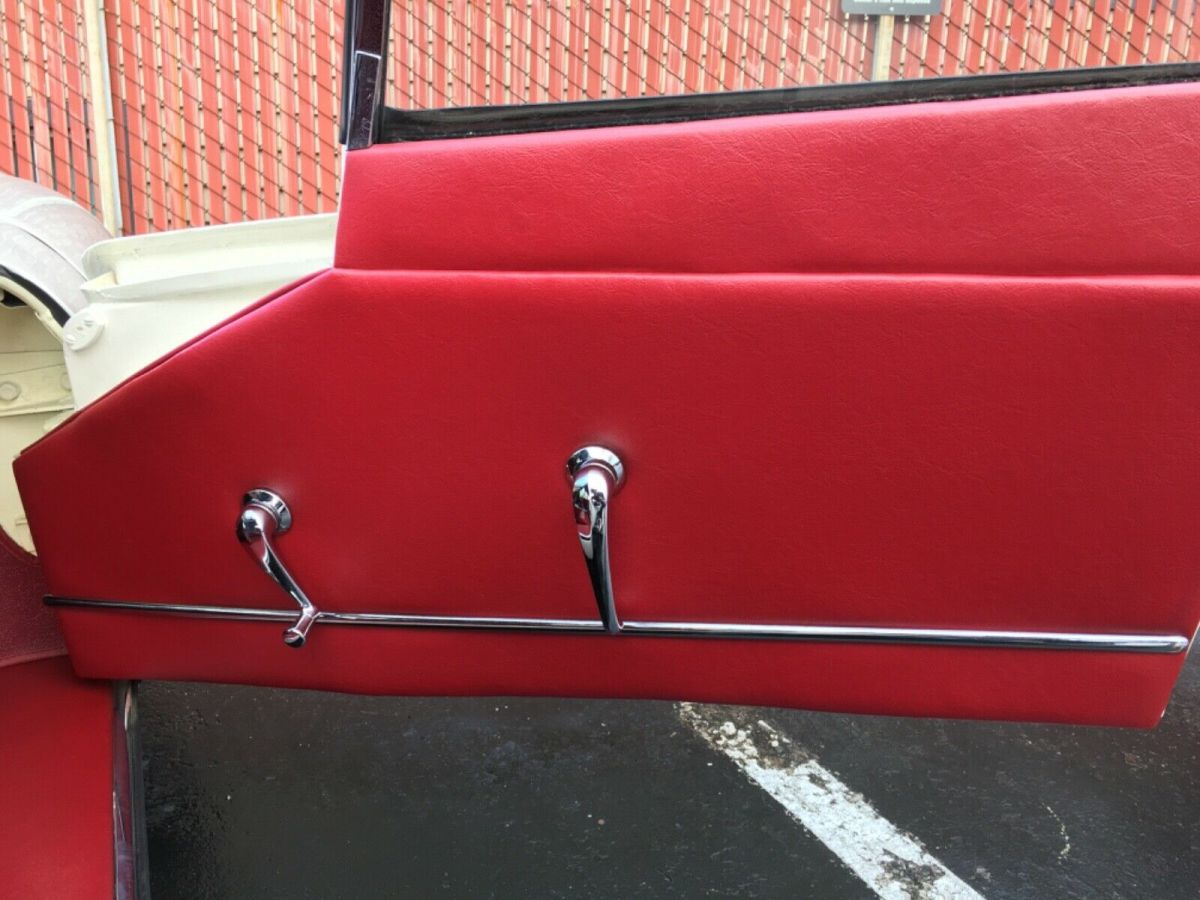 1962 White Jaguar E-Type Convertible