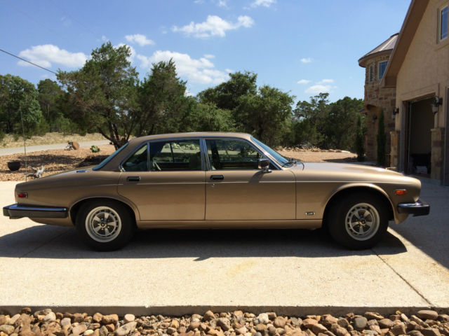 1985 Gold Jaguar XJ6 4 door sedan