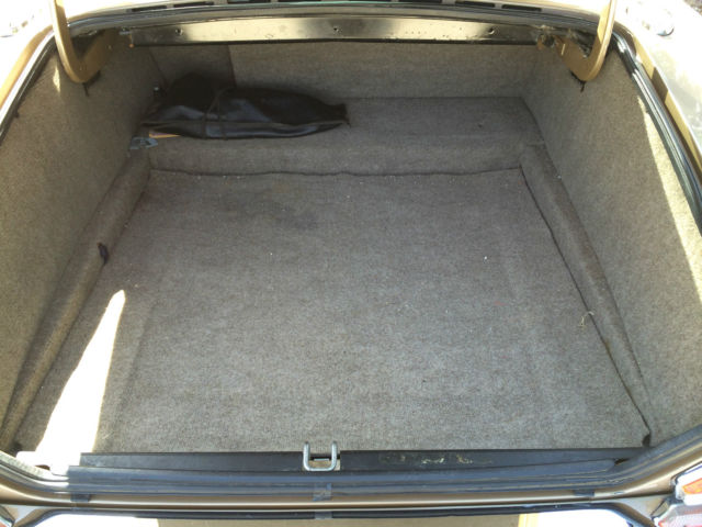 1985 Gold Jaguar XJ6 4 door sedan