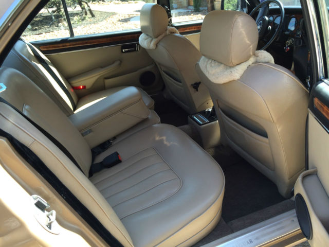 1985 Gold Jaguar XJ6 4 door sedan