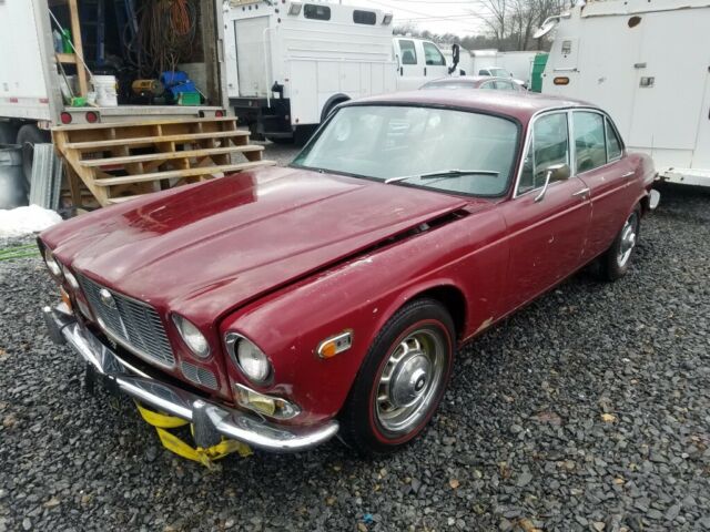 1971 Burgundy Jaguar XJ6 Sedan