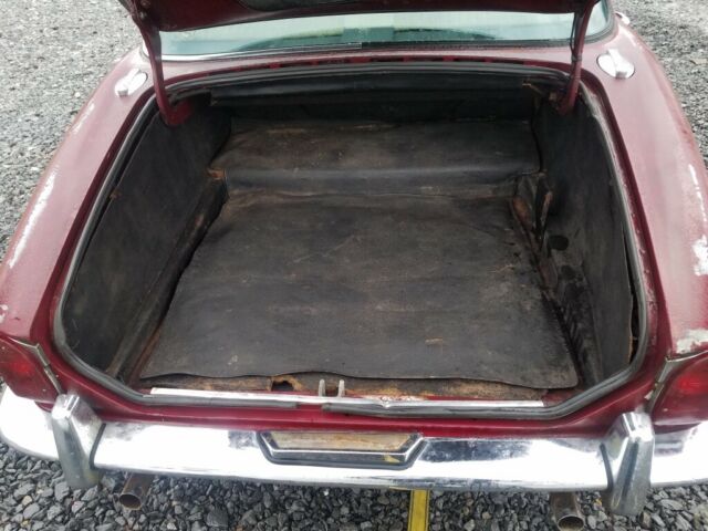 1971 Burgundy Jaguar XJ6 Sedan