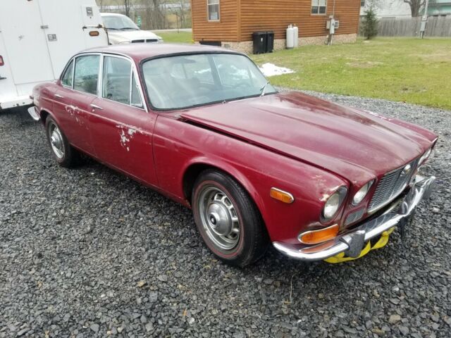 1971 Burgundy Jaguar XJ6 Sedan