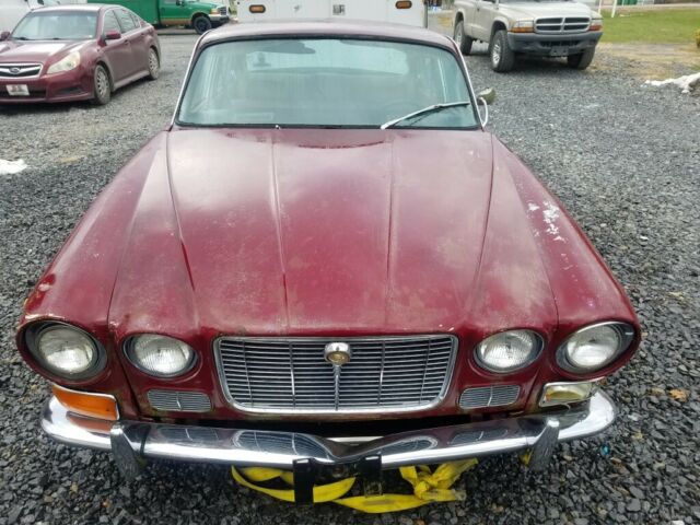 1971 Burgundy Jaguar XJ6 Sedan