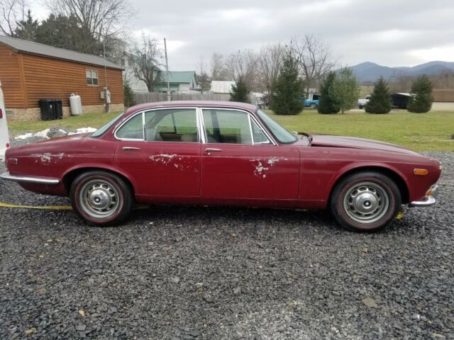 1971 Burgundy Jaguar XJ6 Sedan