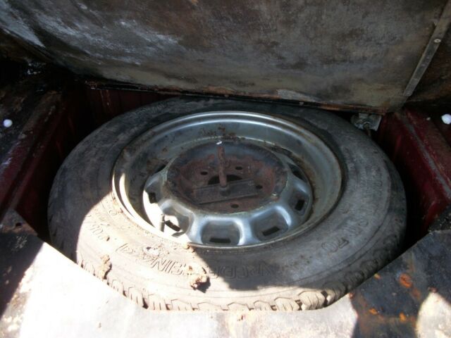 1971 Burgundy Jaguar XJ6 Sedan