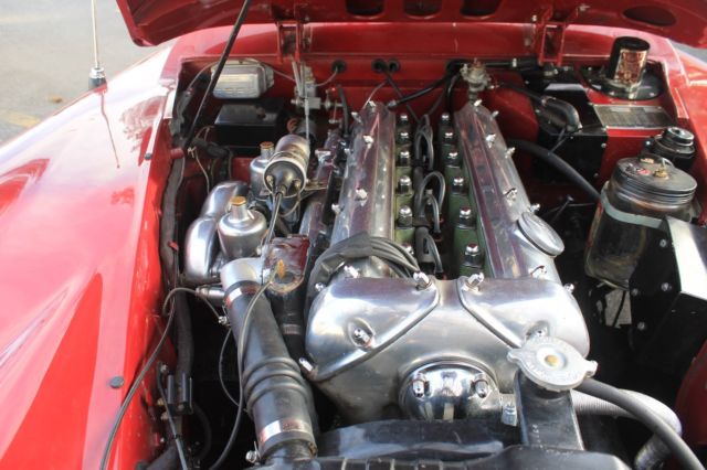 1959 Red Jaguar XK Drophead Coupe