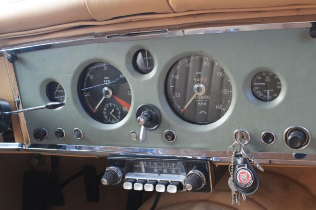 1959 Red Jaguar XK Drophead Coupe