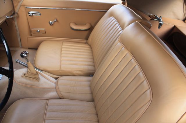 1959 Red Jaguar XK Drophead Coupe