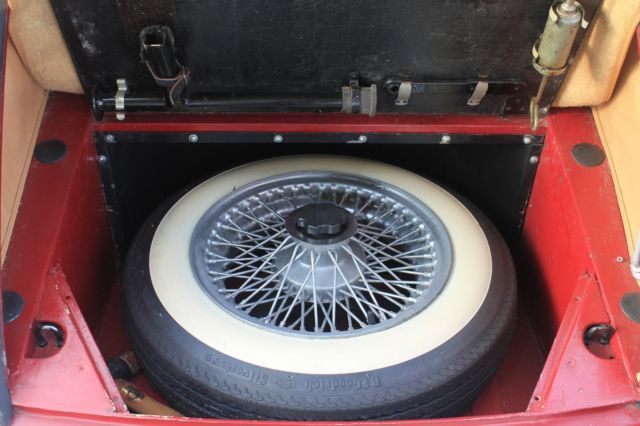 1959 Red Jaguar XK Drophead Coupe