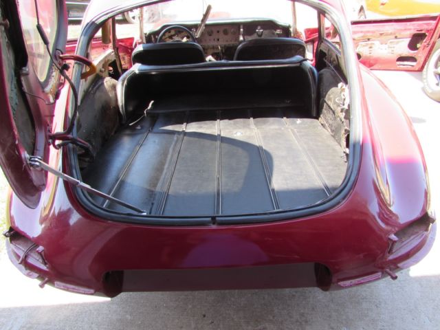 1967 Burgundy Jaguar E-Type Coupe