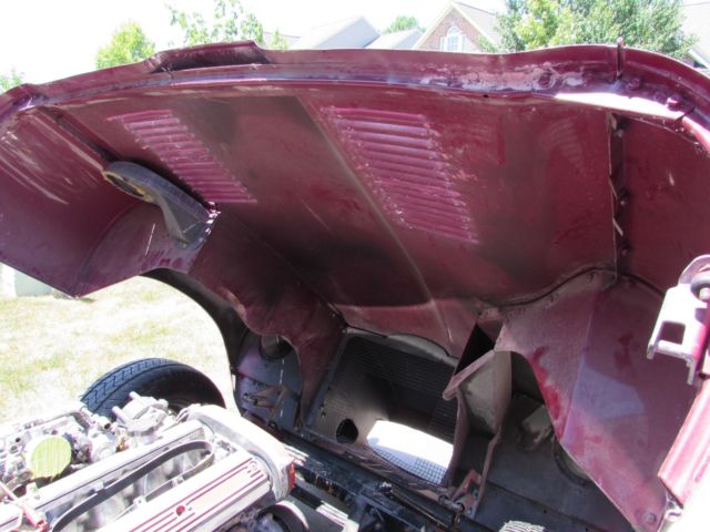 1967 Burgundy Jaguar E-Type Coupe