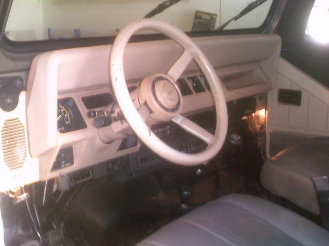 1989 Gold Jeep Wrangler Convertible