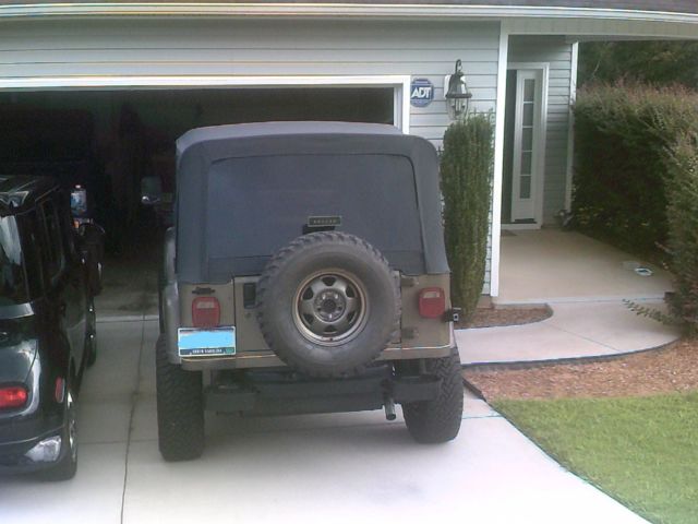 1989 Gold Jeep Wrangler Convertible
