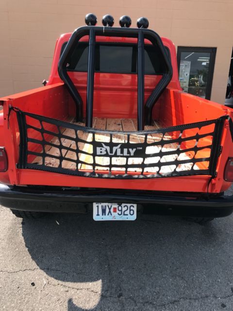 1968 Orange / black Chevrolet C-10 Stepside single cab