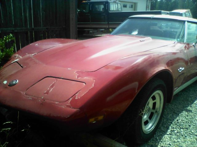 1975 red Chevrolet Corvette coupe