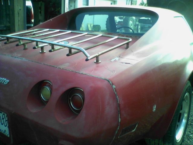 1975 red Chevrolet Corvette coupe