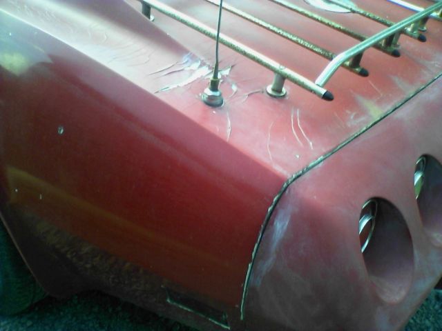 1975 red Chevrolet Corvette coupe