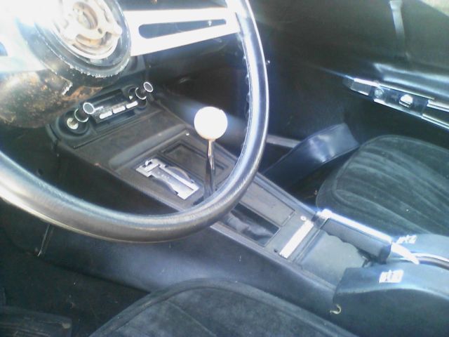 1975 red Chevrolet Corvette coupe