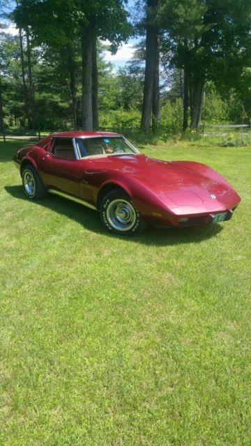 1975 dark red metallic Chevrolet Corvette Coupe