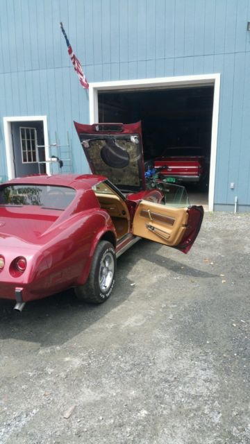 1975 dark red metallic Chevrolet Corvette Coupe