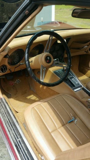 1975 dark red metallic Chevrolet Corvette Coupe