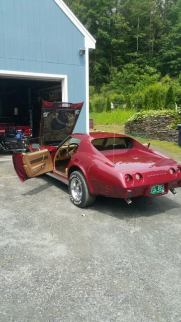1975 dark red metallic Chevrolet Corvette Coupe