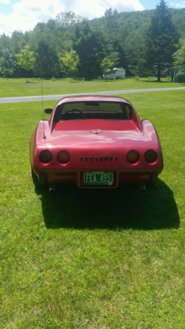 1975 dark red metallic Chevrolet Corvette Coupe