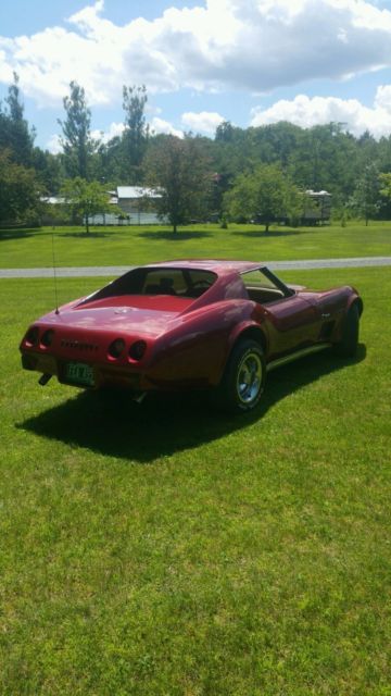 1975 dark red metallic Chevrolet Corvette Coupe