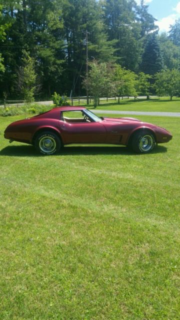 1975 dark red metallic Chevrolet Corvette Coupe