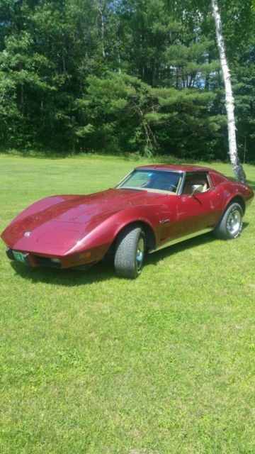 1975 dark red metallic Chevrolet Corvette Coupe