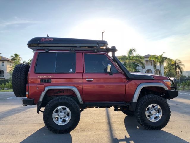 1987 Red Toyota Land Cruiser SUV