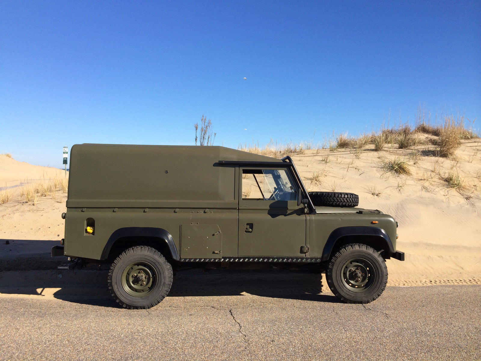 1984 Blue and White Land Rover Defender SUV