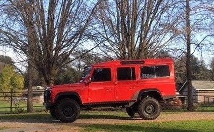 1989 Torch Red Land Rover Defender SUV