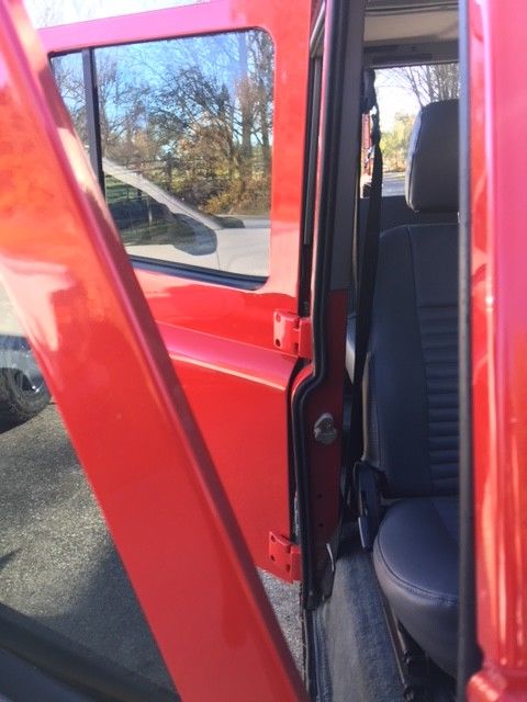1989 Torch Red Land Rover Defender SUV