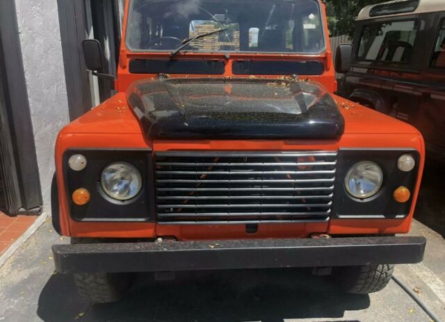 1984 orange Land Rover Defender