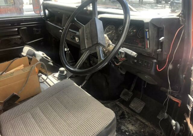 1984 orange Land Rover Defender