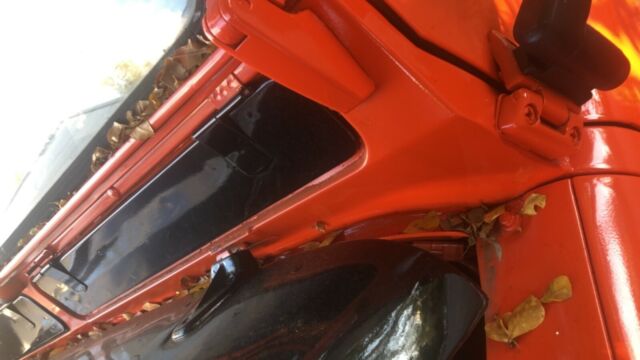 1984 orange Land Rover Defender