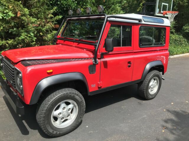 1991 Portofino Red Land Rover Defender