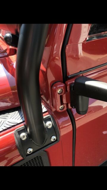 1991 Portofino Red Land Rover Defender