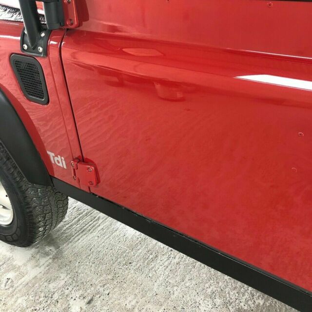 1991 Portofino Red Land Rover Defender